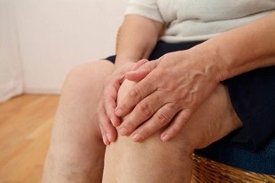 knee arthrosis symptoms